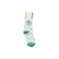 White socks with palm tree pattern and Celebration Florida logo
